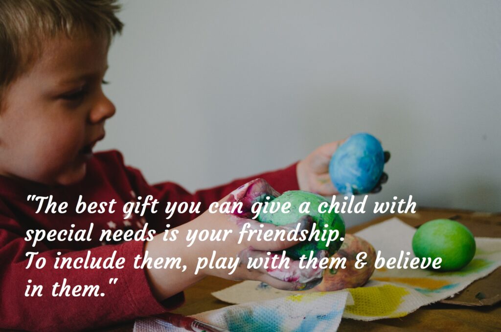 Boy coloring eggs, Autism Awareness Day.