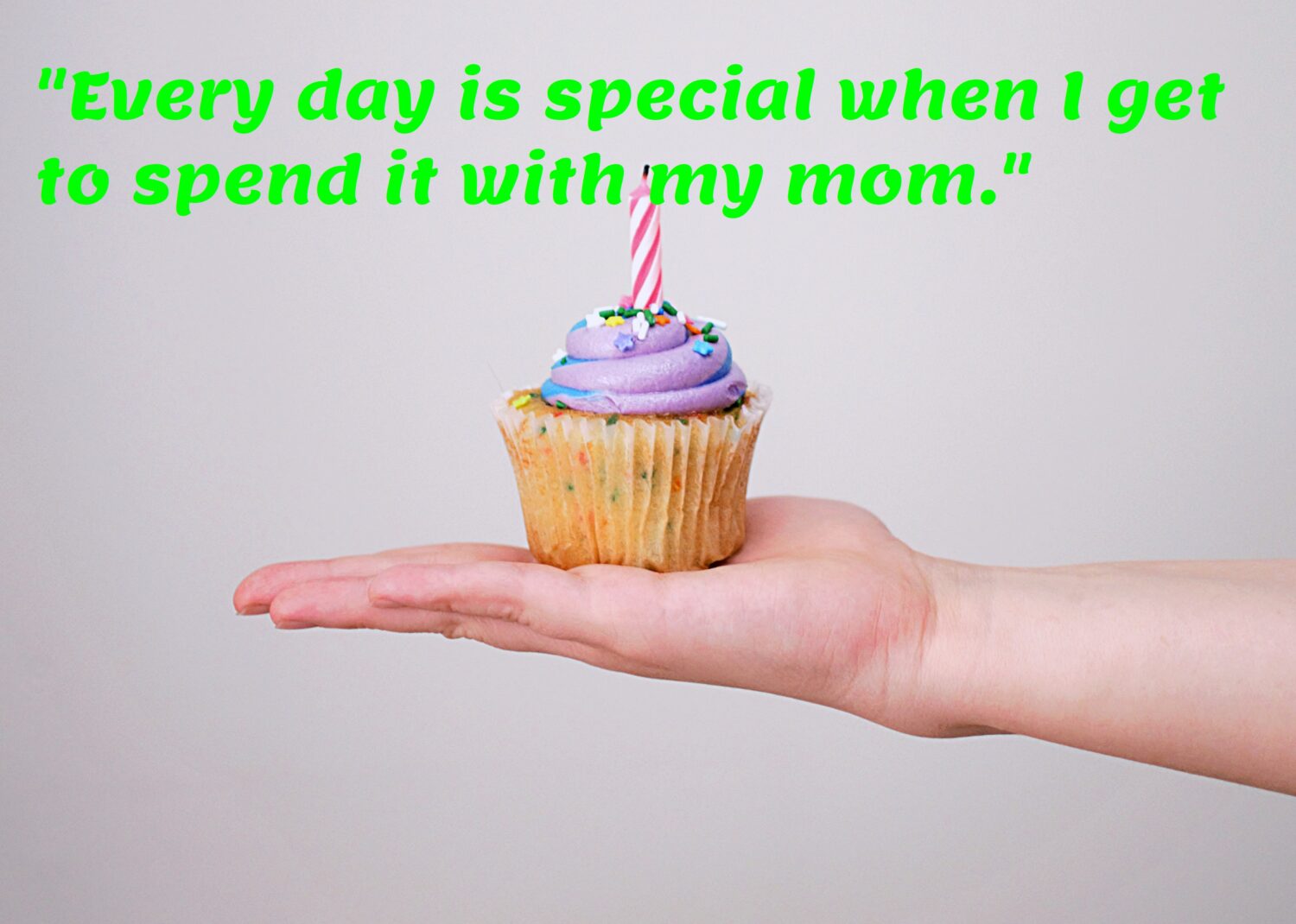 Cupcake in hand, Happy birthday Mom.