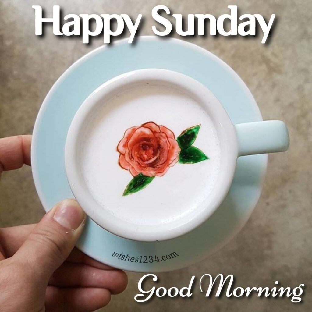 White cup with red rose design on cover, Inspirational Sunday Quotes.